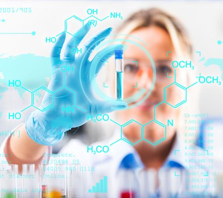 Scientist holding up a test tube with a stopper, molecular structures superimposed in foreground. 